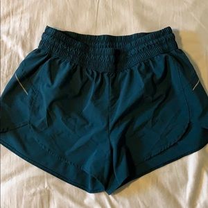 Target All in motion running shorts, teal color